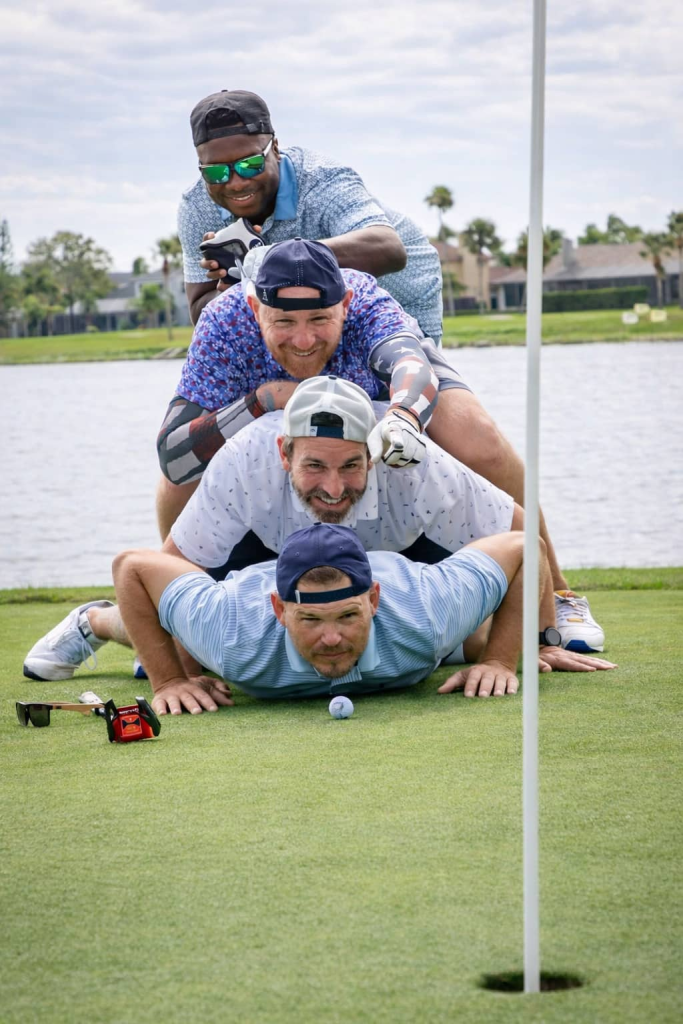 Golfers having fun on golf course 